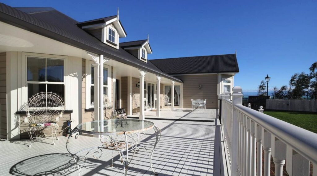 White timber deck and railings at the Wakapuaka colonial home